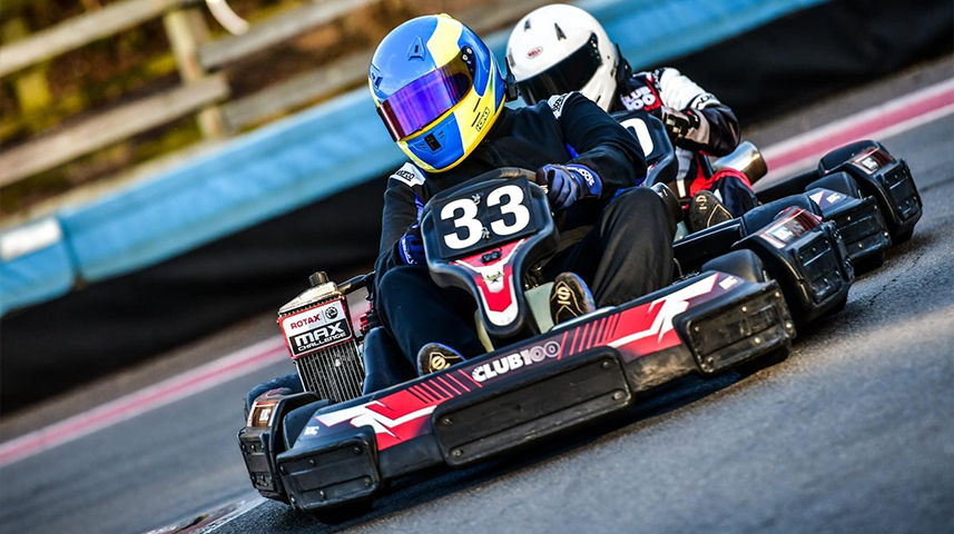 lee henderson kart racing in the club100 rotax kart at buckmore park